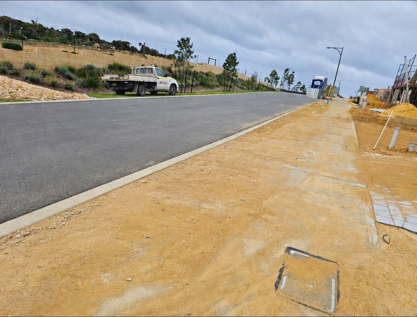 Street verge after sand removal and levelling